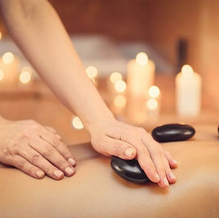 Warm stone massage treatment