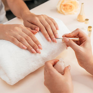 Professional manicure treatment in progress