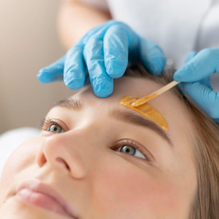 Professional eyebrow waxing treatment